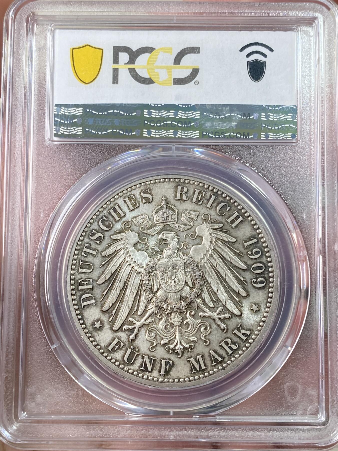 万国钱币拍卖第064期 PCGS MS64 1909萨克森莱比锡大学长翅5马克 经典品种 丝绸转光底板 浓郁烟熏环彩极美收藏级品质