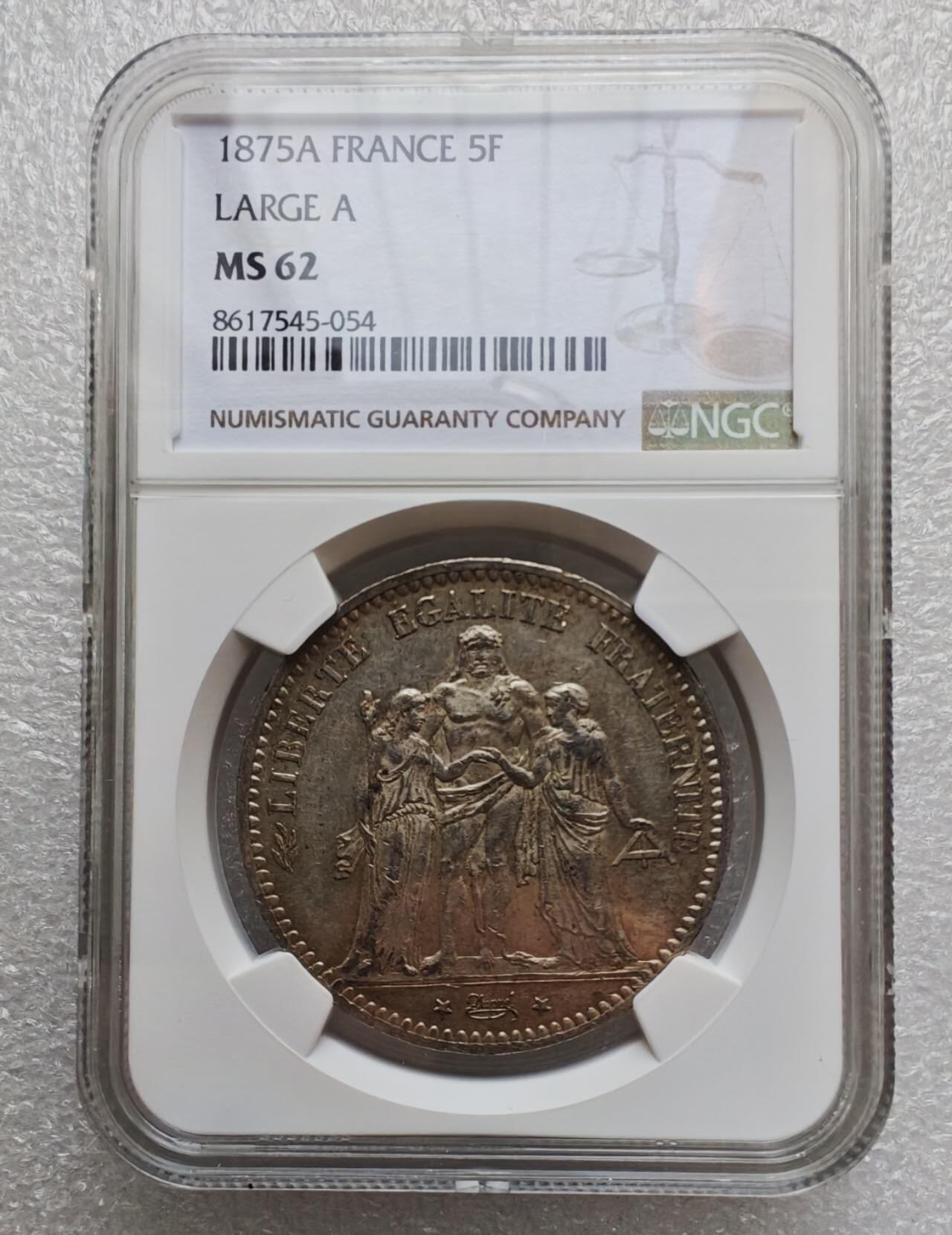 瓶子🏺第235期拍卖会  法国1875年稀少A版大力神5法郎银币（NGC MS 62）   法兰西第三共和国（French Third Republic）时期的经典赫拉克勒斯（Hercules）5法郎大银币，巴黎造币厂（Mark A）铸造，经NGC评级为 MS 62，是近代欧洲机制银币的精品