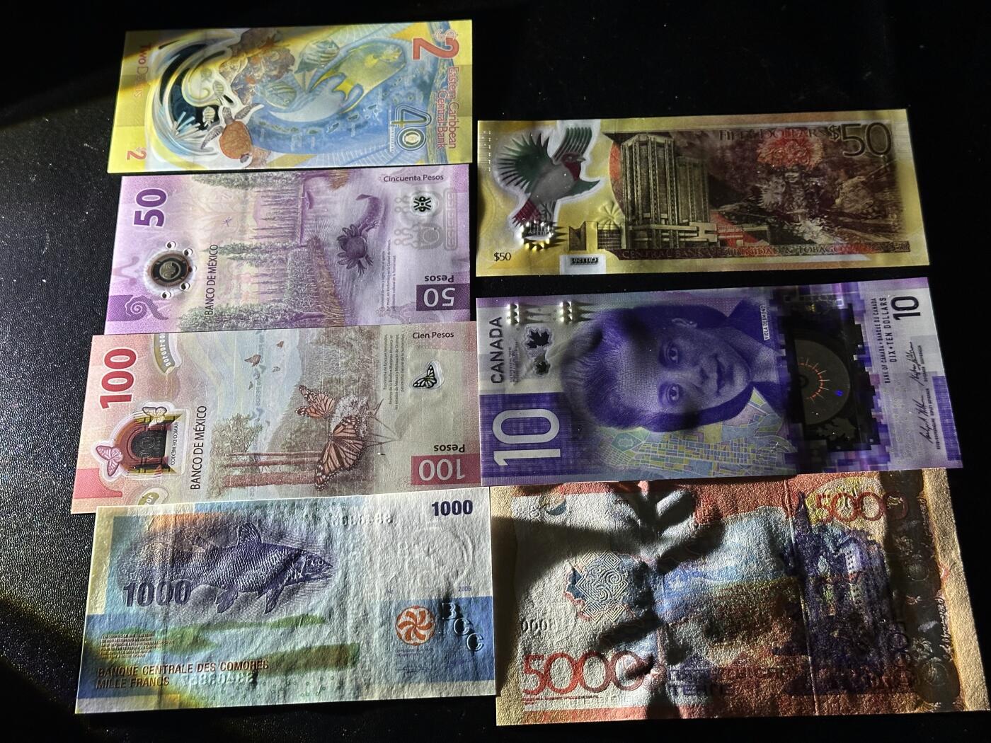 《外钞收藏家》第六百二十三期（精选场）（长期征集拍品、欢迎藏友们联系合作） 墨西哥、科摩罗、加拿大、哈萨克斯坦等获奖钞和纪念钞 7张一起 全新UNC