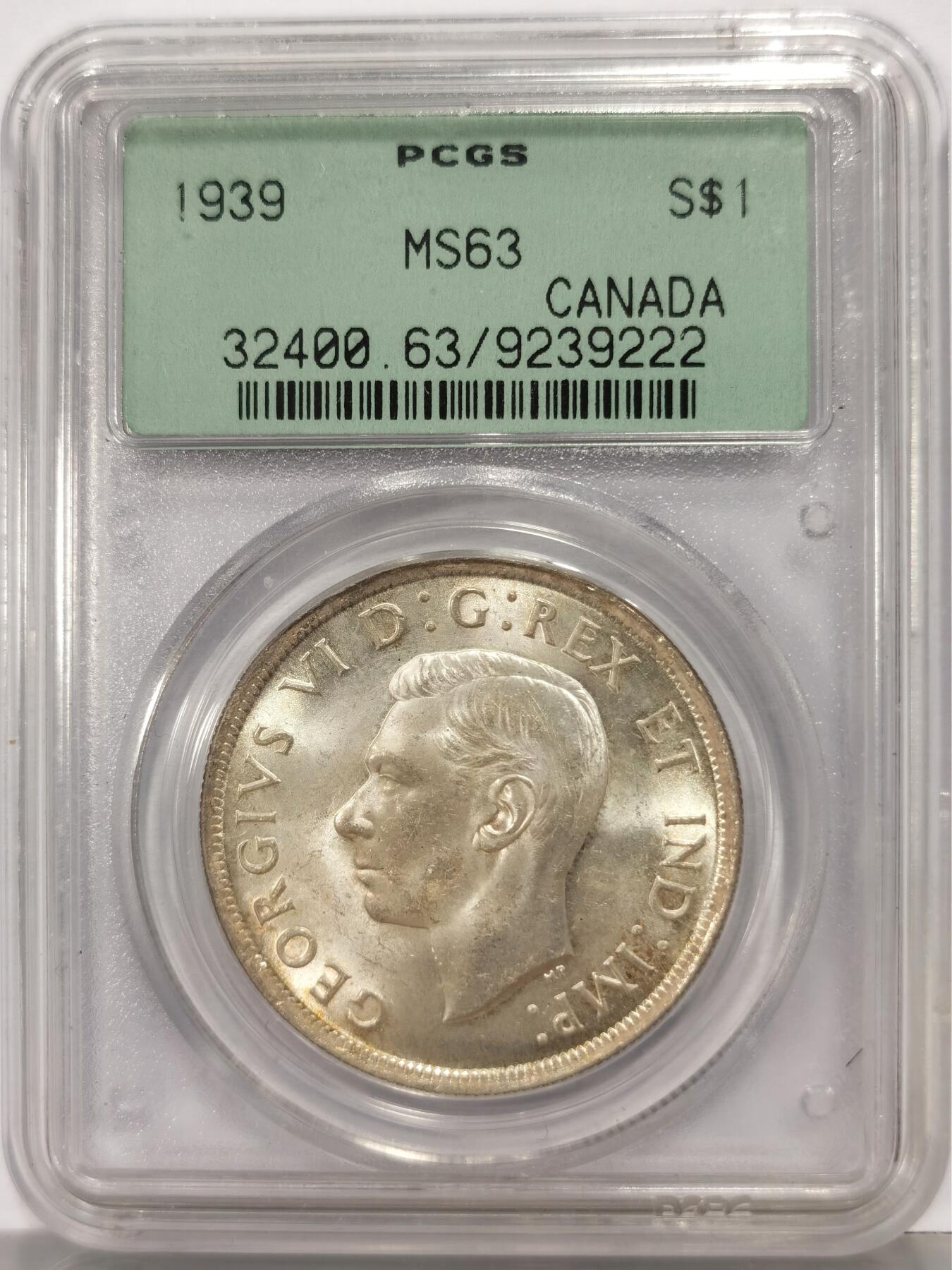博洋堂世界钱币拍卖第167期（全场包邮） PCGS MS63 加拿大1939年乔治六世皇室访问1元银币，币面清爽干净又舒适，状态佳。经典最早的老绿盒，盒子本身就是古董级别的收藏品。