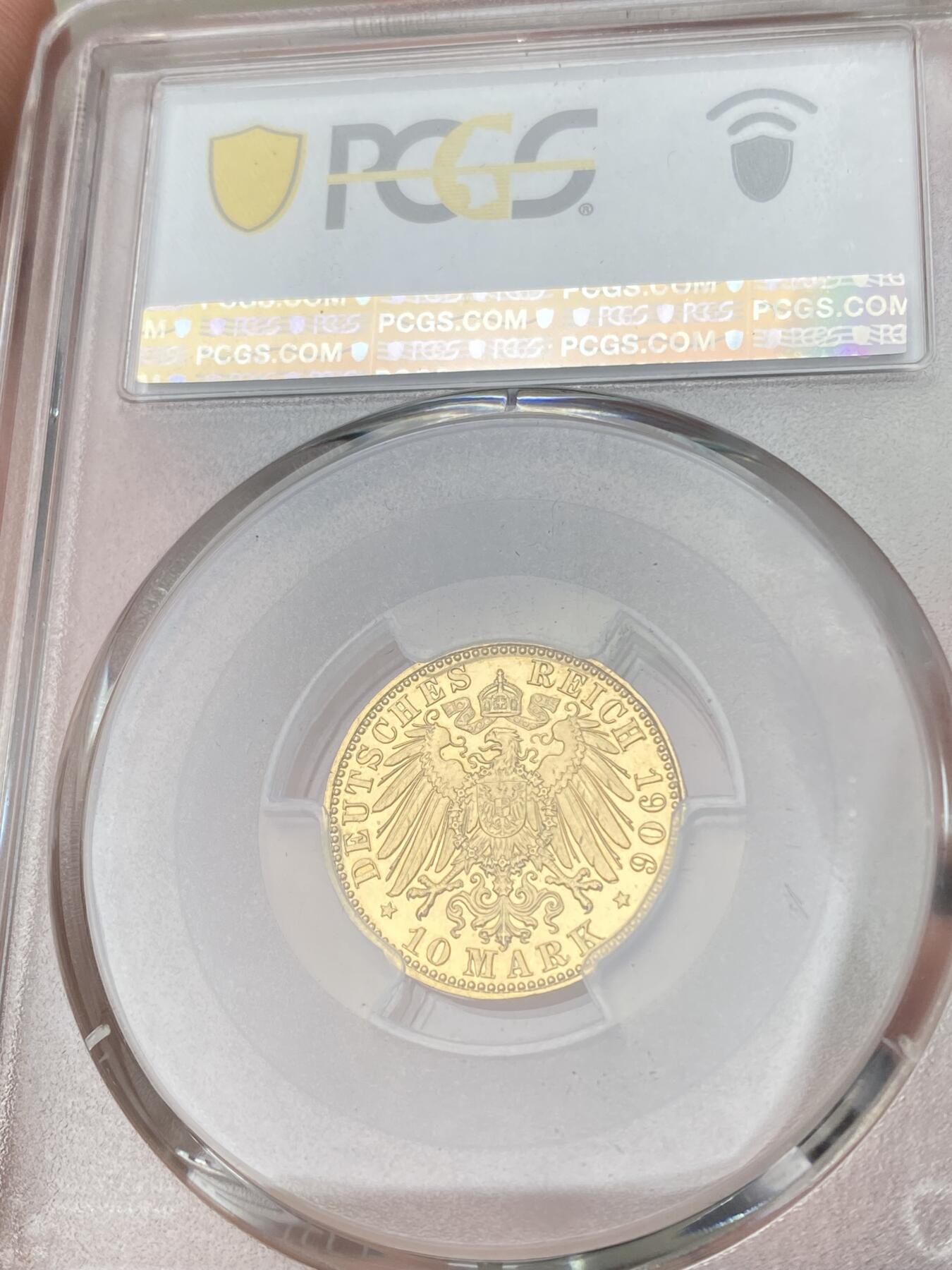 万国钱币拍卖第064期 PCGS PR63CAM 1906年德国萨克森阿尔伯特国王长翅精制10马克金币 深度镜面精制黄金地板 高浮雕喷砂质感 PC唯一冠军分 罕见典藏品质 3.98g 900金