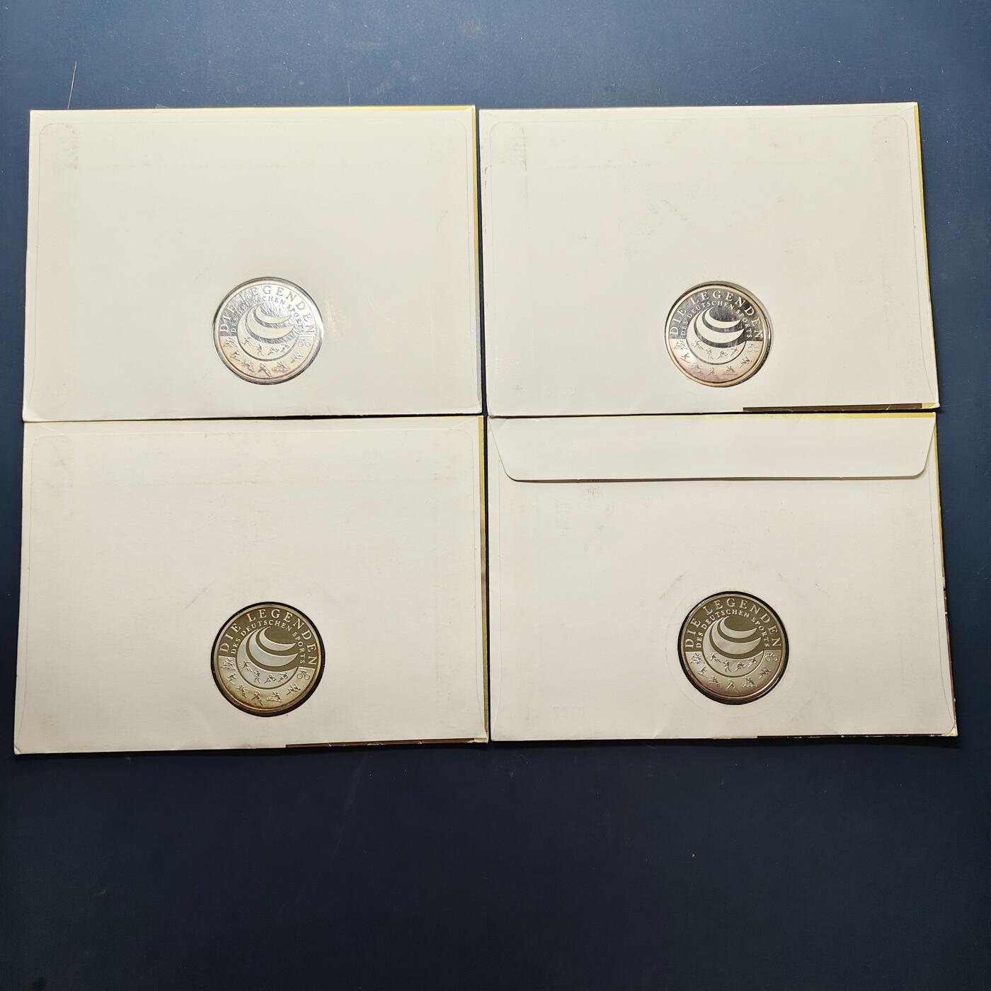 【全场包邮】纯粹捡漏拍517场 【纪念章】德国2011年德国体育与奥林匹克博物馆历史传奇系列精制纪念邮章封4枚套（女子跳高乌尔里克·迈法特/男子游泳迈克尔·格罗斯/女子游泳克里斯汀·奥托/女子足球布里特·普林兹）