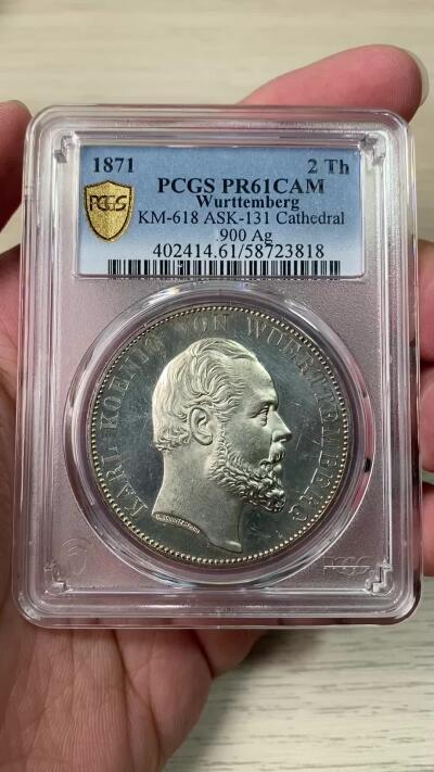 万国钱币拍卖第064期 PCGS PR61CAM 1871年德国符腾堡乌尔姆大教堂2泰勒 德系2泰勒大名誉品种 德意志精工细作的代表 精制深度镜面底板和满喷砂的人像与教堂形成强烈反差 无疑是一种视觉享受 难得CAM收藏级品质  