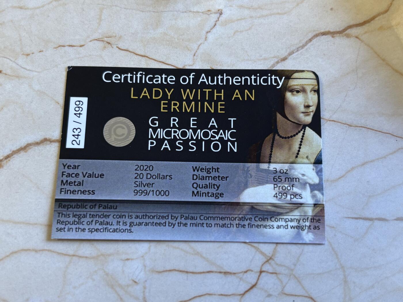 第196期拍卖 帕劳2020年马赛克系列4抱貂的女人3盎司彩色银币，999银，发行量499枚