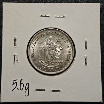 【德藏】世界币章拍卖第170期（拍品征集中~欢迎藏友联系） 老藏家集藏系列之- 1942年 英属南非1先令银币 800银 直径约：23.6mm；重约：5.6g 入册20余年·附有当年购入价