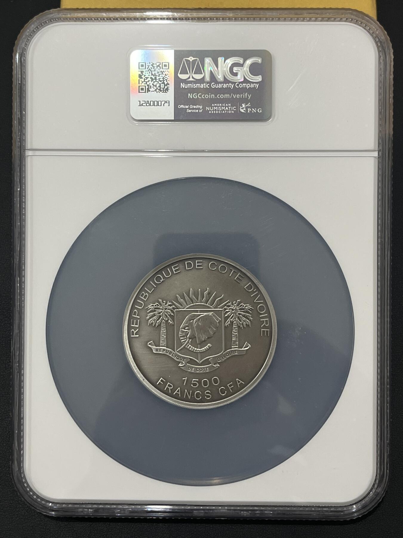 ❤️【币观天下】❤️ 第347期钱币拍卖场- 2026.4.3周五晚上6点半场 长期征集拍品  克劳斯最佳创意币奖科特迪瓦仿古银币，有盒证无配件勺子，ngc69