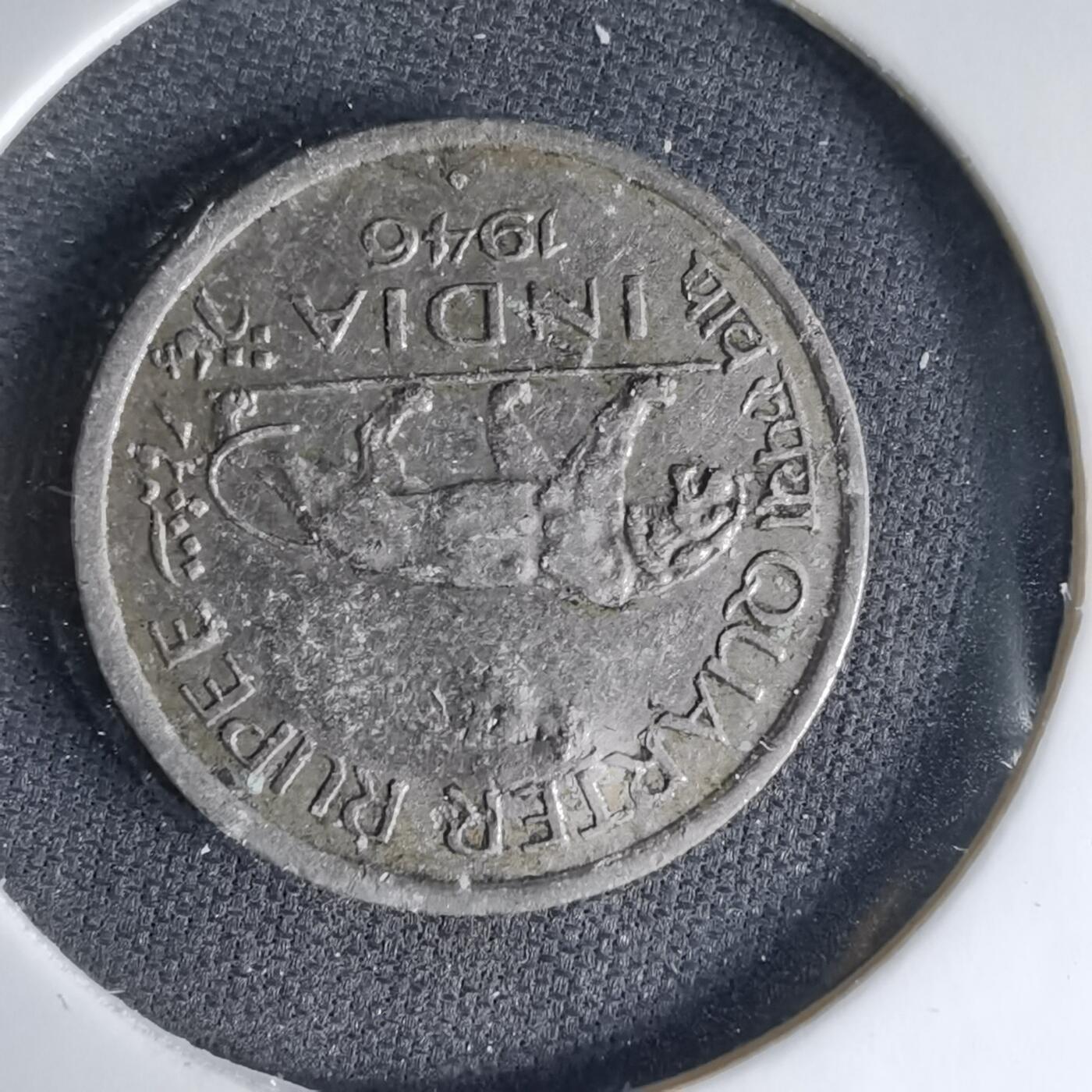 沼泽如烟--第1041场 英属东印度1946年四分之一卢比有伤