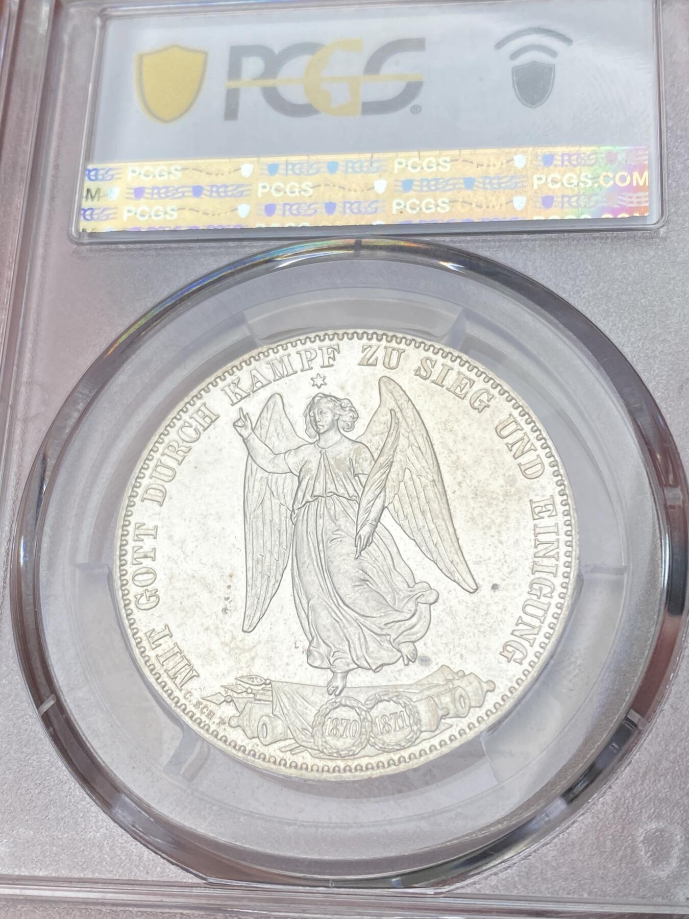 万国钱币拍卖第064期 PCGS PR62 1871年德国符腾堡普法战争精制胜利泰勒 在普制易得而精制难求的胜利系列中 精制符腾堡又是其中难度较大的品种 深度镜面底板与银霜感极强的浮雕形成强烈对比 顶级收藏品质