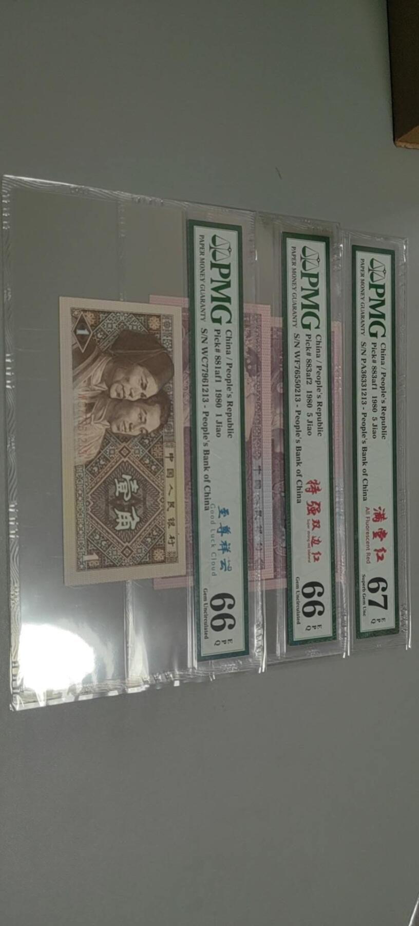 洪涛臻品批发群 精选邮票限时拍卖第1303期  第四套人民币 1角至尊祥云5角满堂红5角特强双边红 PMG评级尾三同号中文标一组。号码如图，之前炙手可热的PMG中文标，现在都是地板价，喜欢不要错过