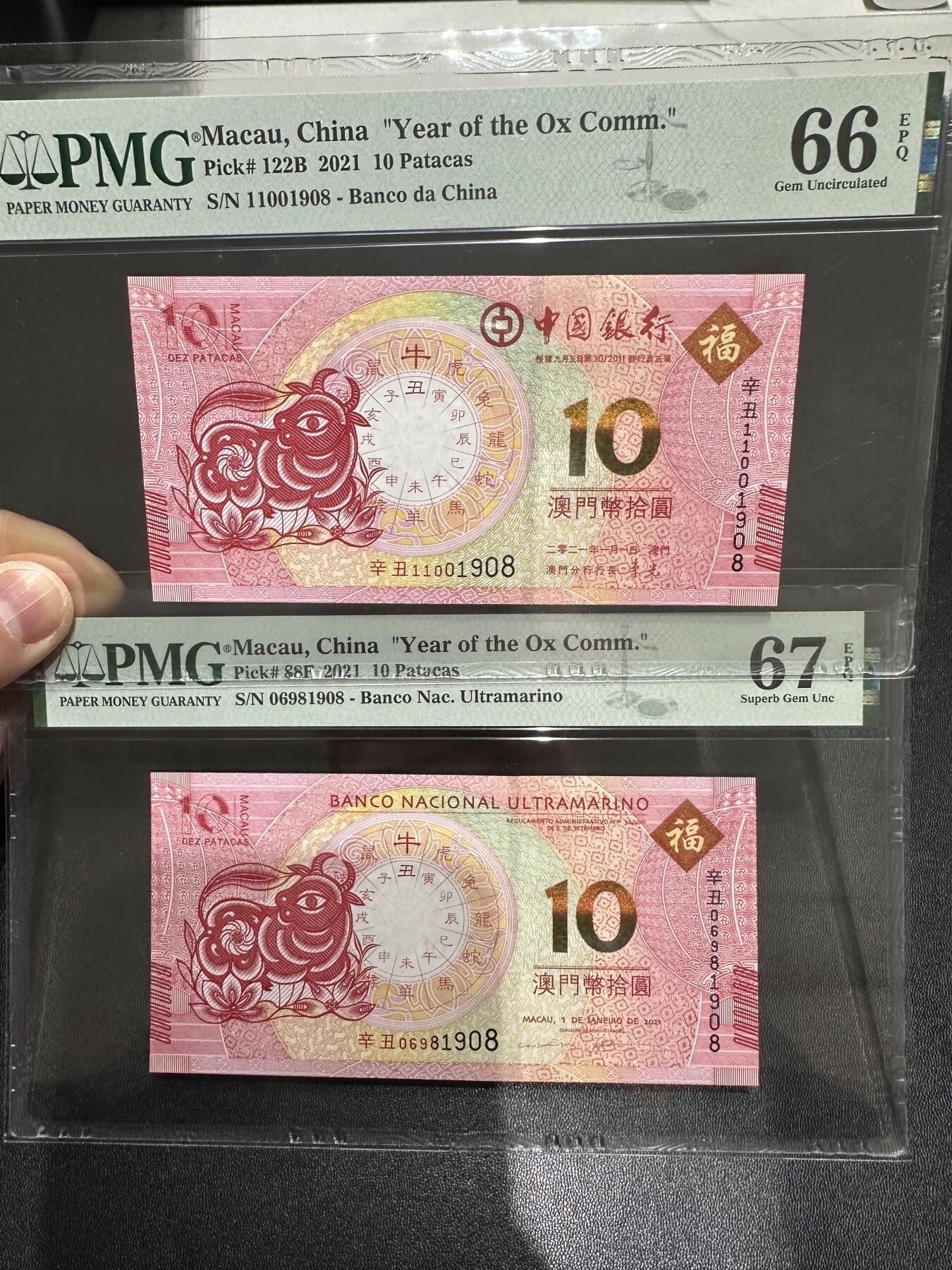 《外钞收藏家》第六百二十三期（精选场）（长期征集拍品、欢迎藏友们联系合作） 2021牛年澳门生肖纪念钞一对 尾4同1908 PMG66、67 两张都是dao zhi hao 