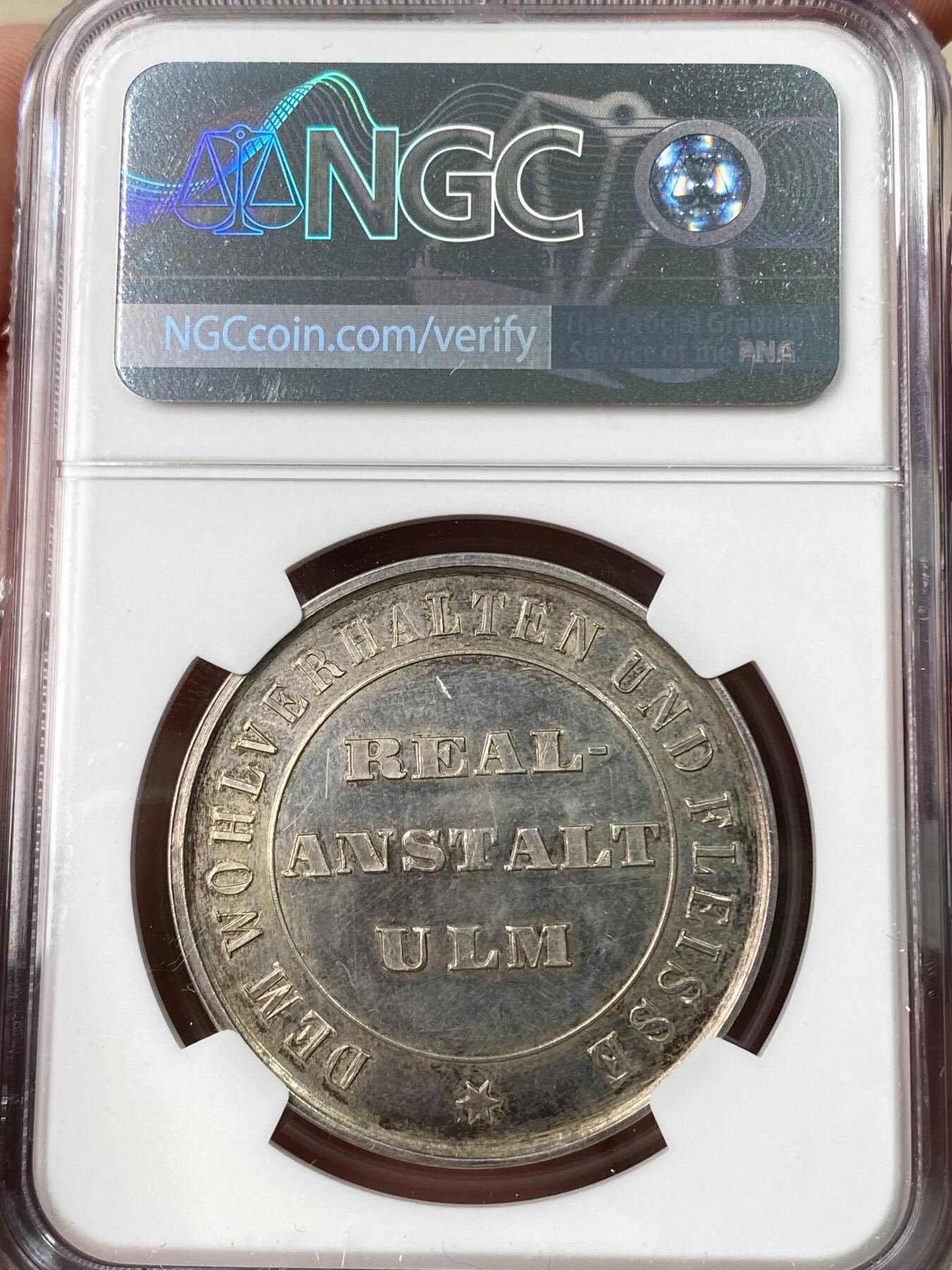 万国钱币拍卖第064期 NGC MS62 1850年左右德国符腾堡-乌尔姆学业优质纪念银章 正面是正在修建中的乌尔姆大教堂 原味淡彩环绕 深度精铸镜面喷砂大教堂极美 