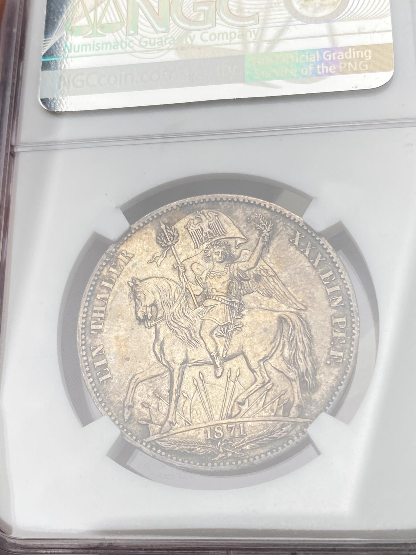 万国钱币拍卖第064期 NGC MS63 1871年德国-萨克森普法战争胜利泰勒 胜利系列中难度最大品种 经典骑马女武神凯旋 原味香槟色转光环彩收藏级品质