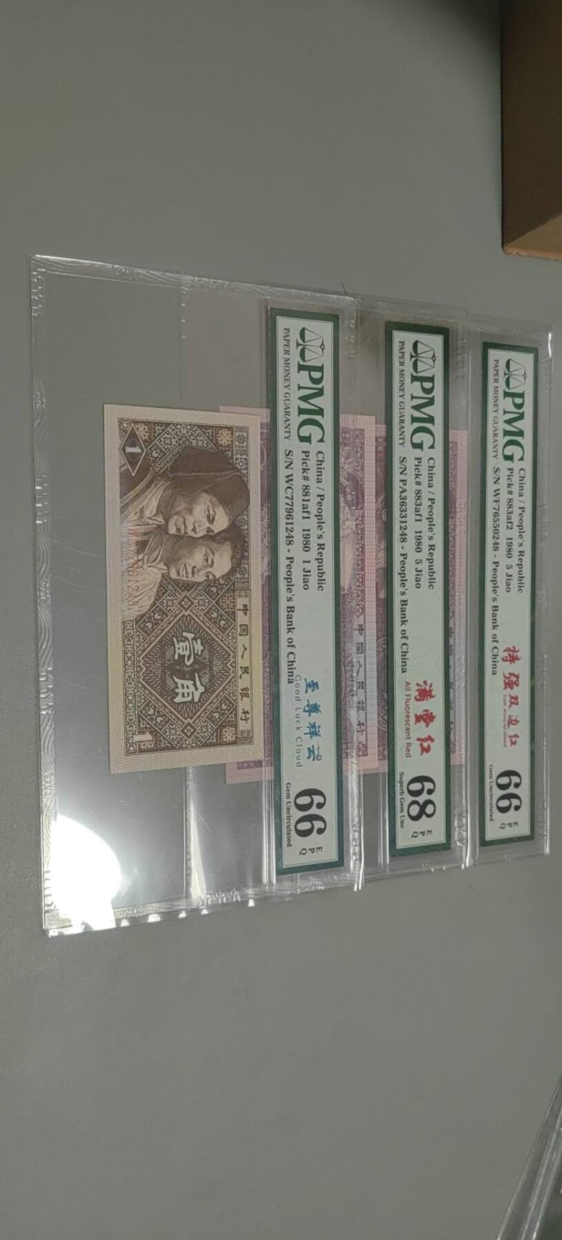 洪涛臻品批发群 精选邮票限时拍卖第1303期  第四套人民币 1角至尊祥云5角满堂红5角特强双边红 PMG评级尾三同号中文标一组。号码如图，之前炙手可热的PMG中文标，现在都是地板价，喜欢不要错过