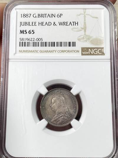 万国钱币拍卖第064期 - NGC MS65 1887英国维多利亚女皇高冠6便士银币面值版 华丽英式天鹅绒五彩也难掩其底光迸发 小中见大的顶级BU状态 典藏级品质