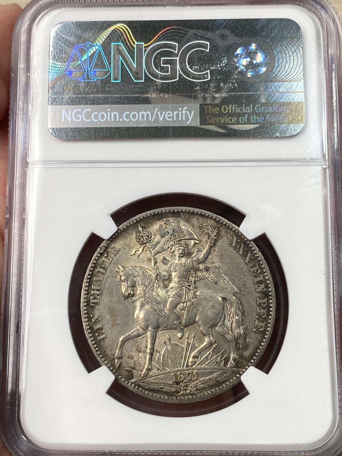万国钱币拍卖第064期 NGC MS63 1871年德国-萨克森普法战争胜利泰勒 胜利系列中难度最大品种 经典骑马女武神凯旋 原味香槟色转光环彩收藏级品质