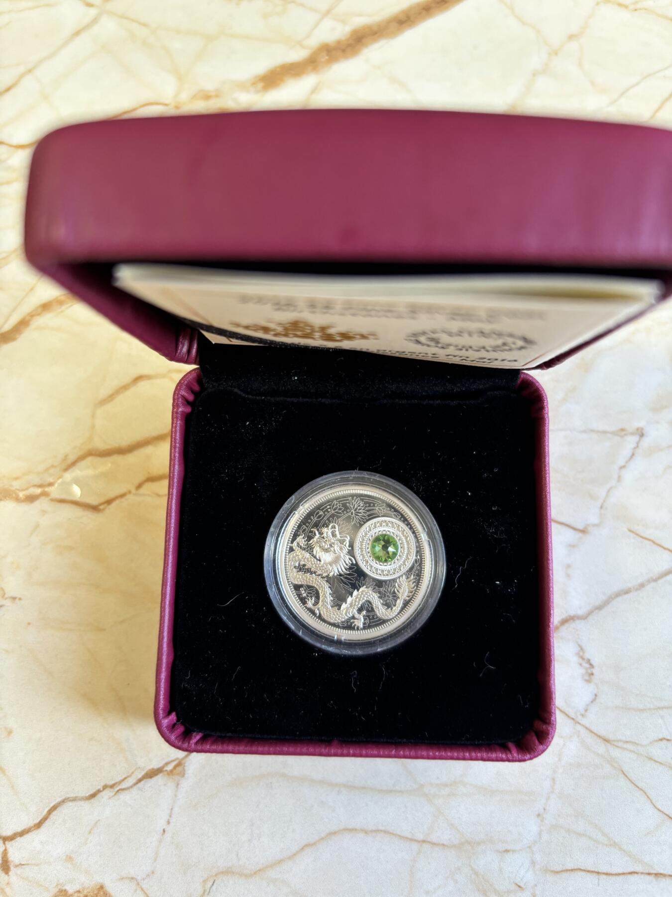 第196期拍卖 加拿大2016年诞生幸运石系列五月幸运石绿宝石纪念银币，9999银，1/4盎司，发行3000枚