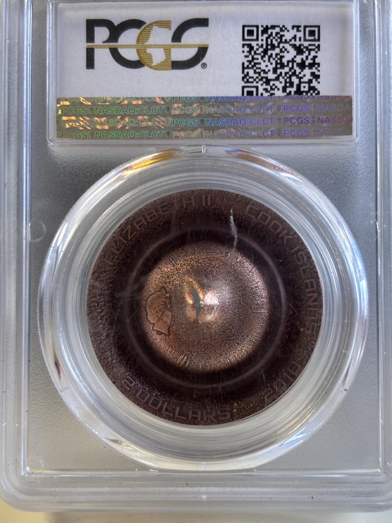 第196期拍卖 库克2018年镶摩洛哥沙漠陨石镀铜银币PCGS-MS70首无原盒证书，999银，1/2盎司，直径38.61毫米，发行2500枚，