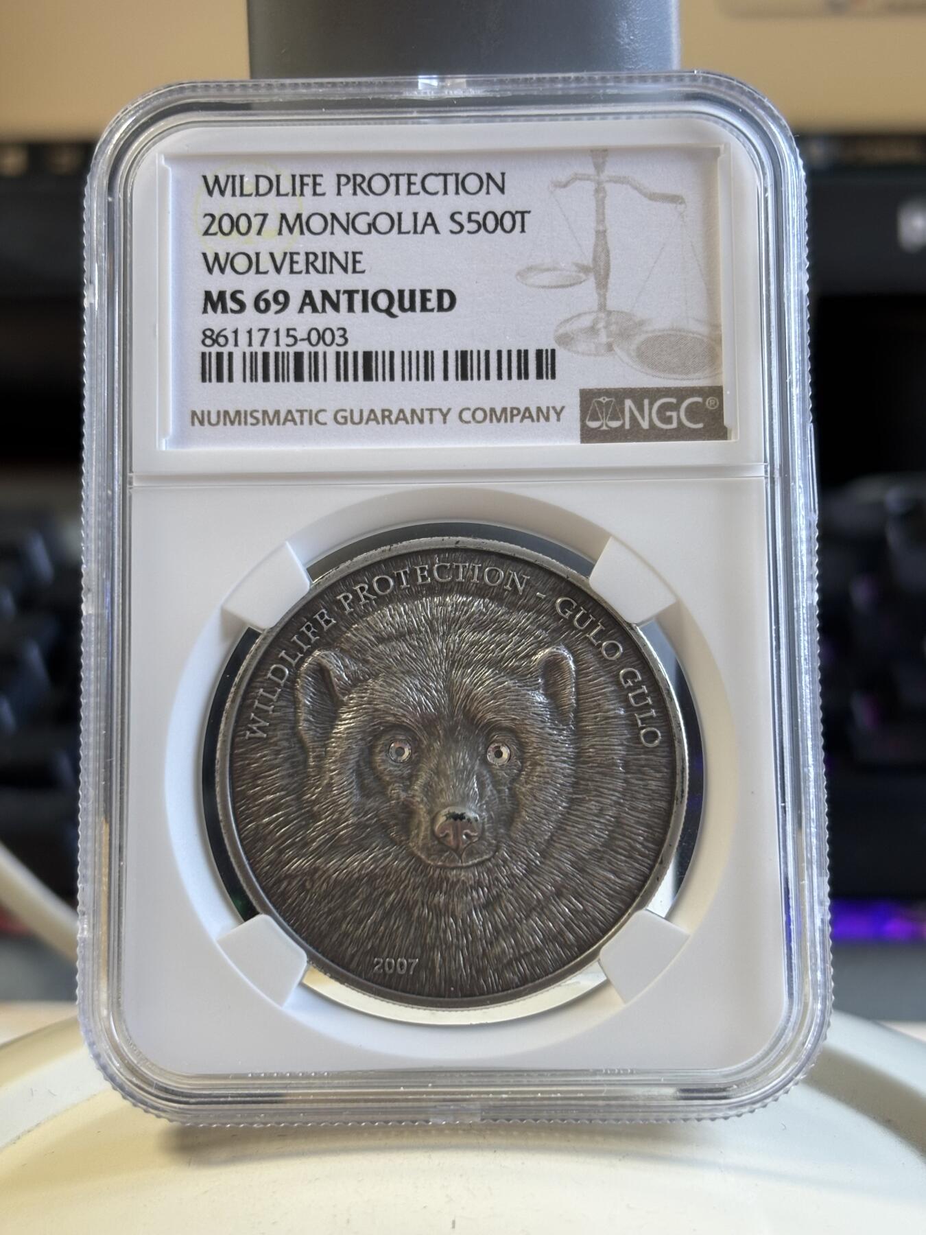 第195期拍卖 获奖蒙古2007年仿古动物狼獾镶水晶银币NGC-MS69带证书，999银，发行2500枚