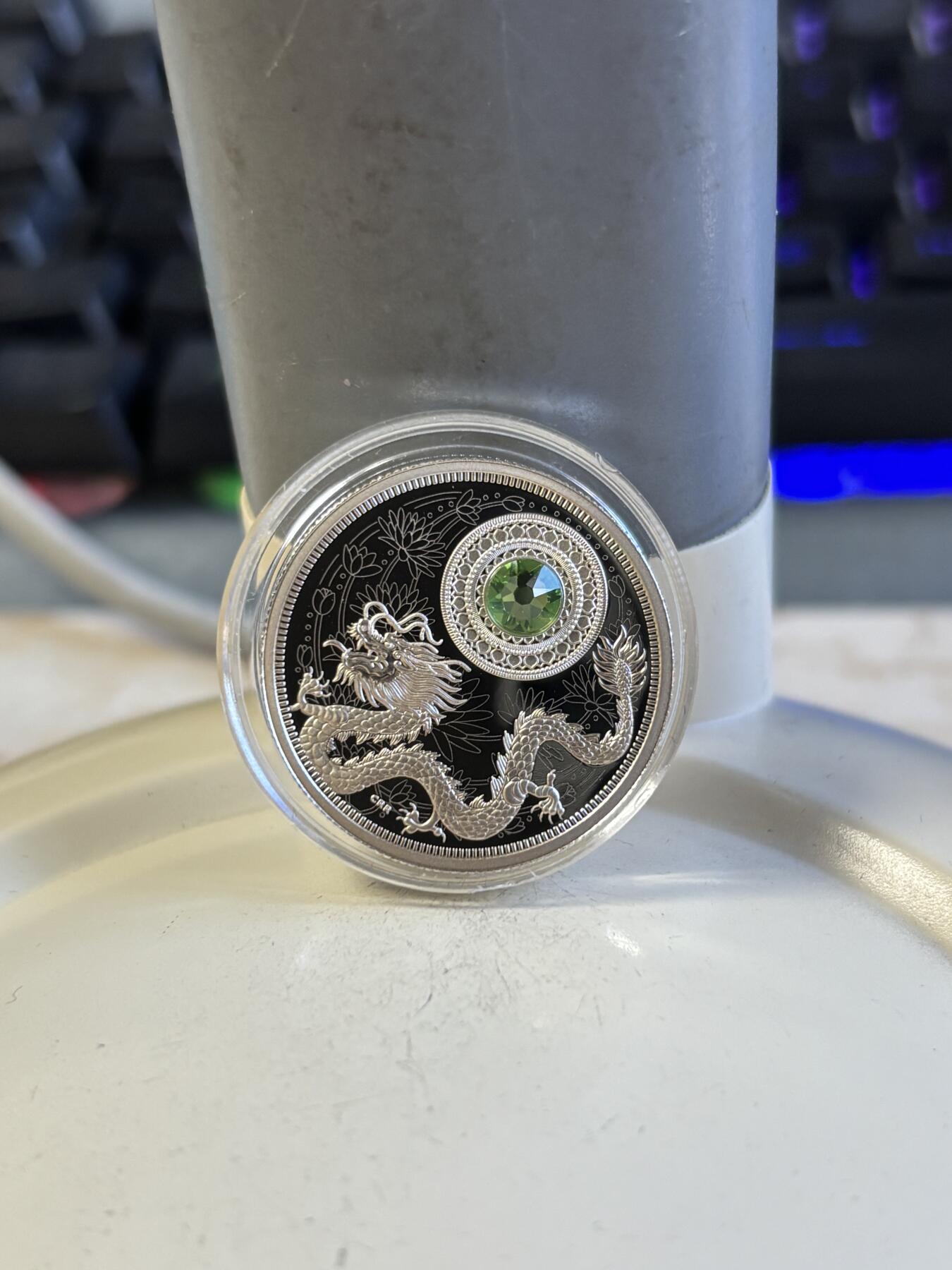 第196期拍卖 加拿大2016年诞生幸运石系列五月幸运石绿宝石纪念银币，9999银，1/4盎司，发行3000枚