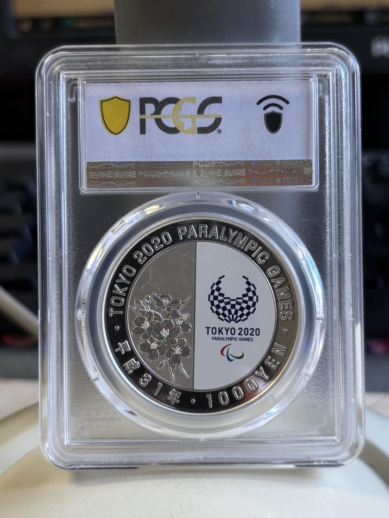 第196期拍卖 日本2019年东京残奥会游泳彩色1盎司精制银币PCGS -PR70，999银，