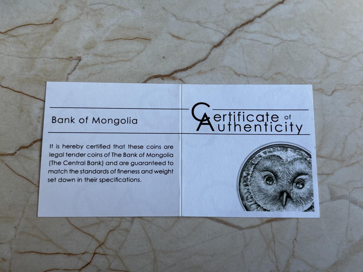 第195期拍卖 获奖蒙古2011猫头鹰仿古镶水晶纪念银币NGC-MS69，999银，发行2500枚，