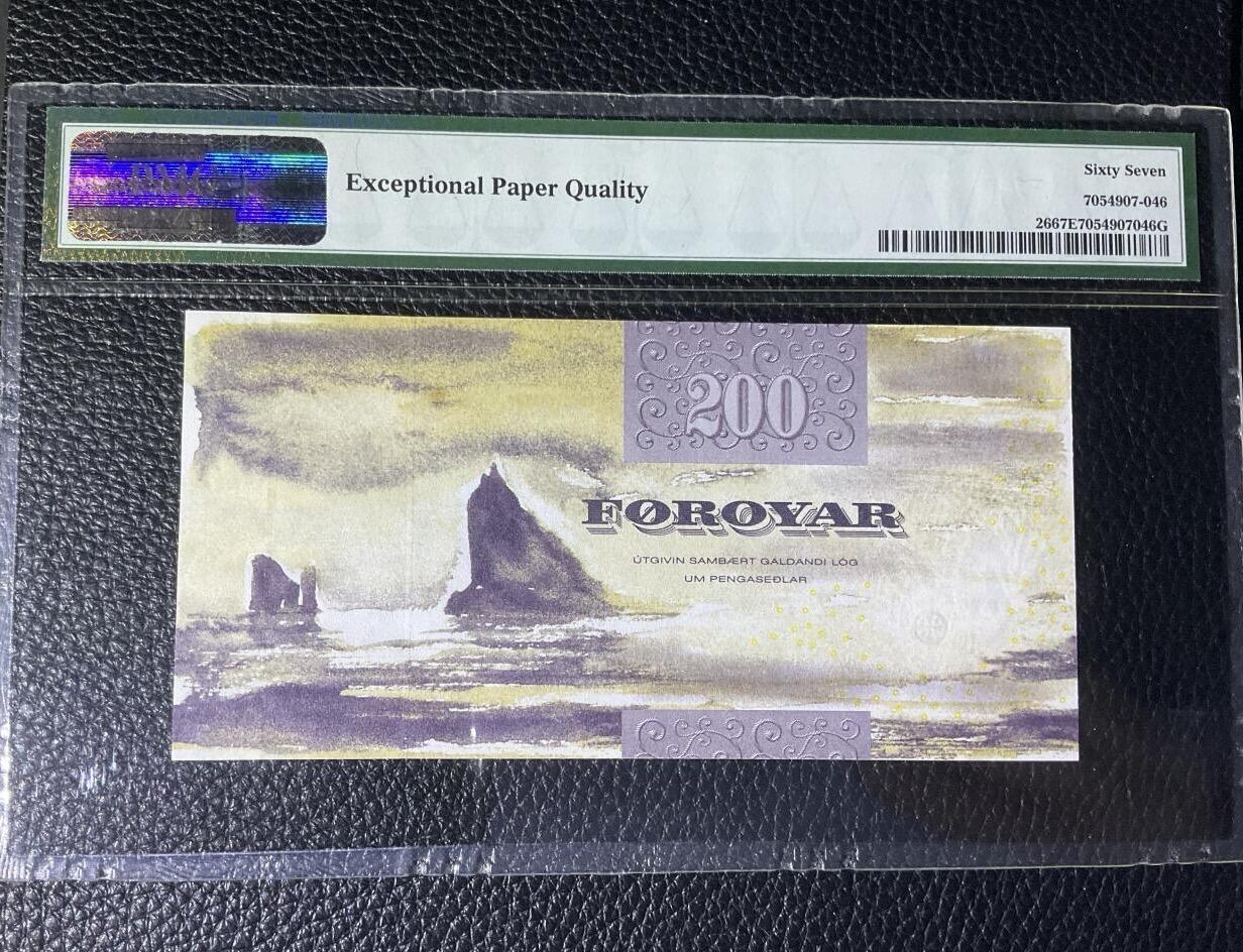 【礼羽收藏】🌏世界钱币拍卖第131期  法罗群岛2003首年首版200 PMG67 老壳严评 (注:首轮细线版)非再版粗线