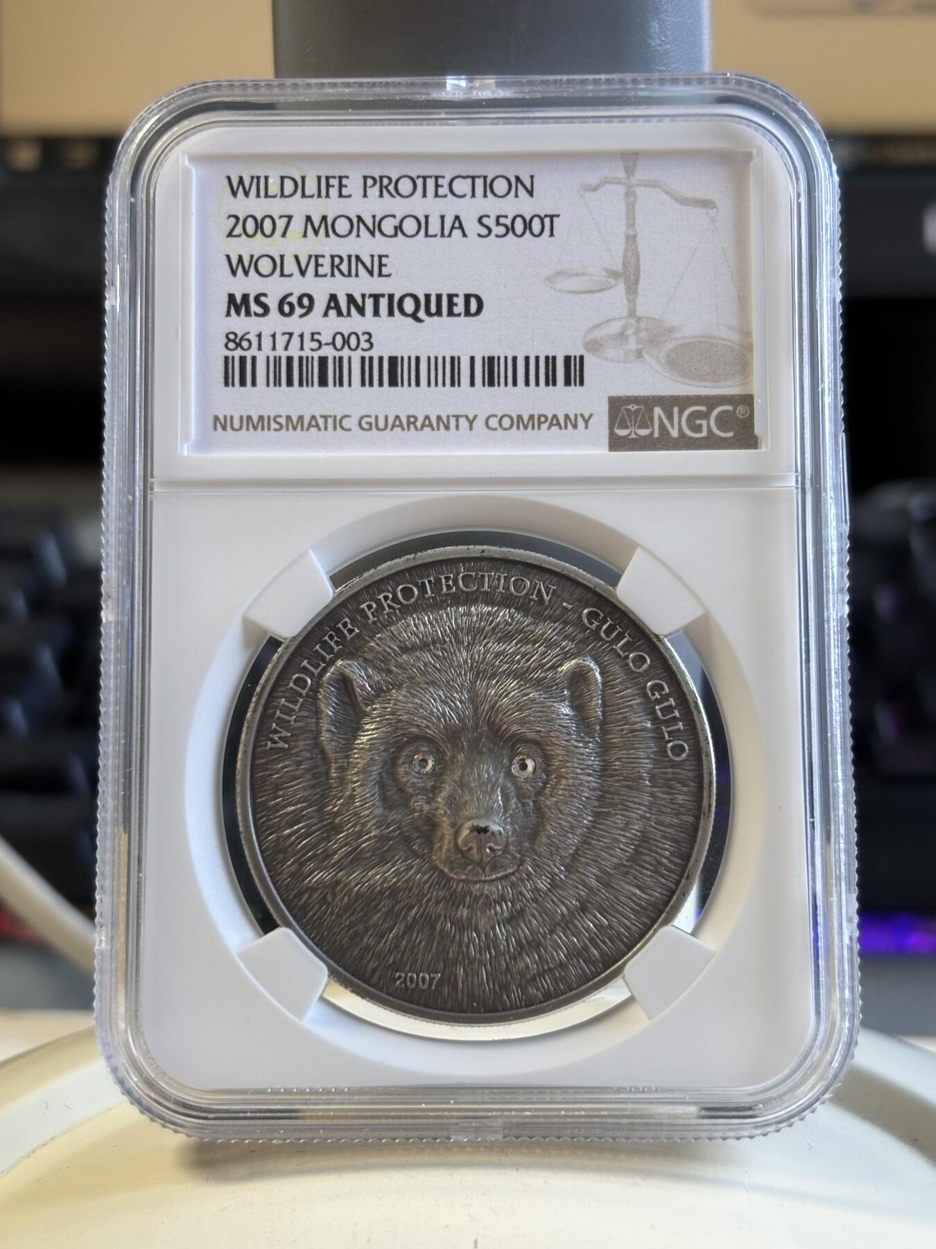 第195期拍卖 获奖蒙古2007年仿古动物狼獾镶水晶银币NGC-MS69带证书，999银，发行2500枚