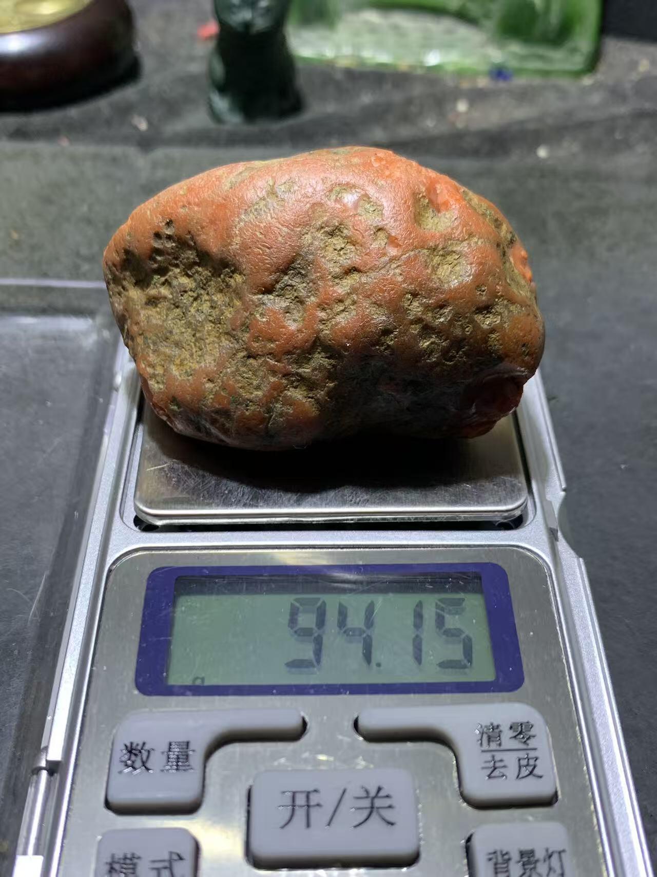 精美柿子红皮开窗料飘朱砂点南红玛瑙原石一颗