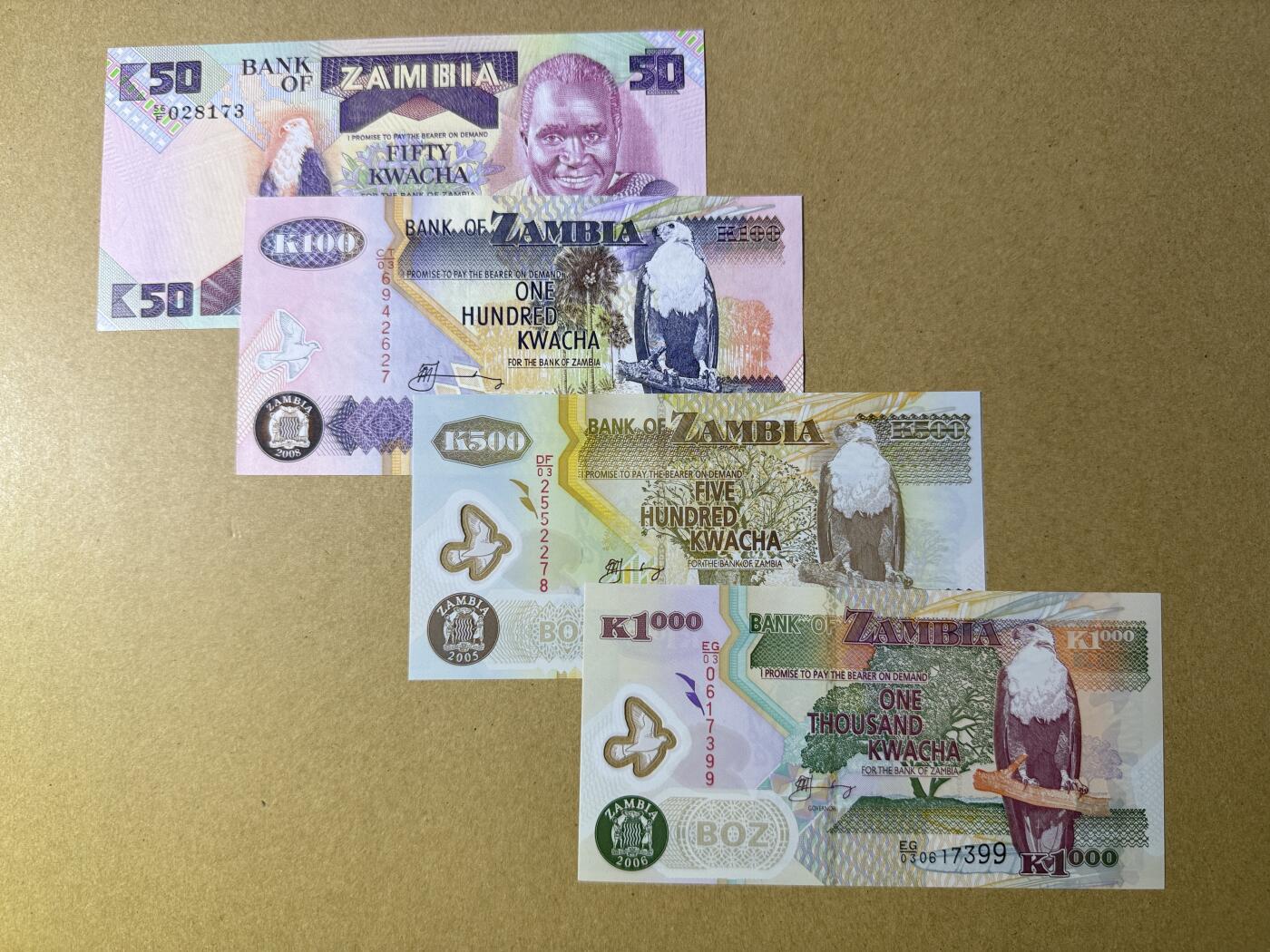 《愛美收藏》第239期-4.5周日外币黄金场  赞比亚4张 UNC 不同面值4张 100的边缘荧光