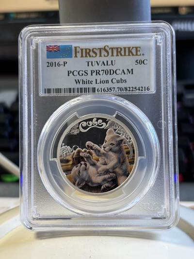 第196期拍卖 - 图瓦卢2016年幼崽白狮宝宝半盎司彩色纪念银币PCGS-PR70,999银，发行5000枚
