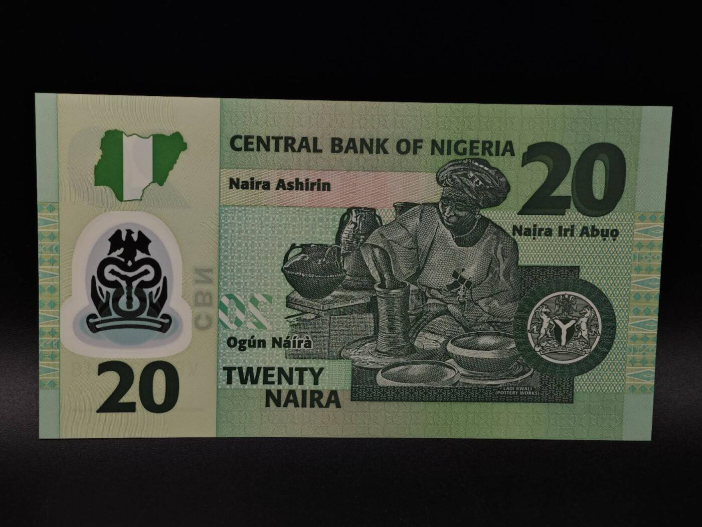  【淘币小摊】限时拍第八百八十九拍   散币套币纸币邮品场    每周一统一发货 尼日利亚20奈亚塑料钞