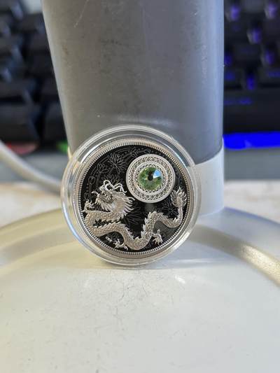 第196期拍卖 - 加拿大2016年诞生幸运石系列五月幸运石绿宝石纪念银币，9999银，1/4盎司，发行3000枚