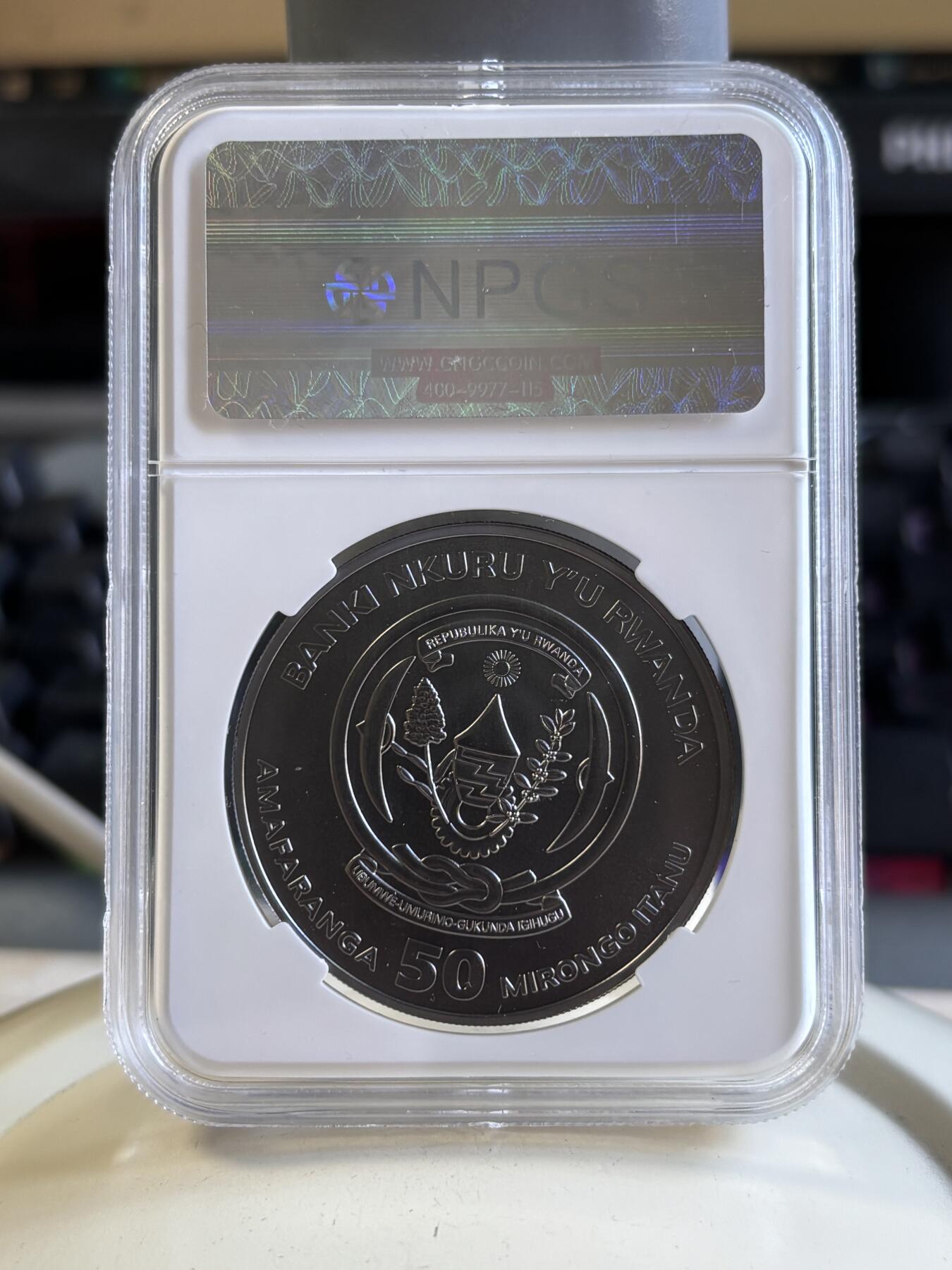 第196期拍卖 卢旺达2016年黑金帝国系列非洲狐獴钌化镀金银币评级，999钌化镀金，1盎司，发行5000枚