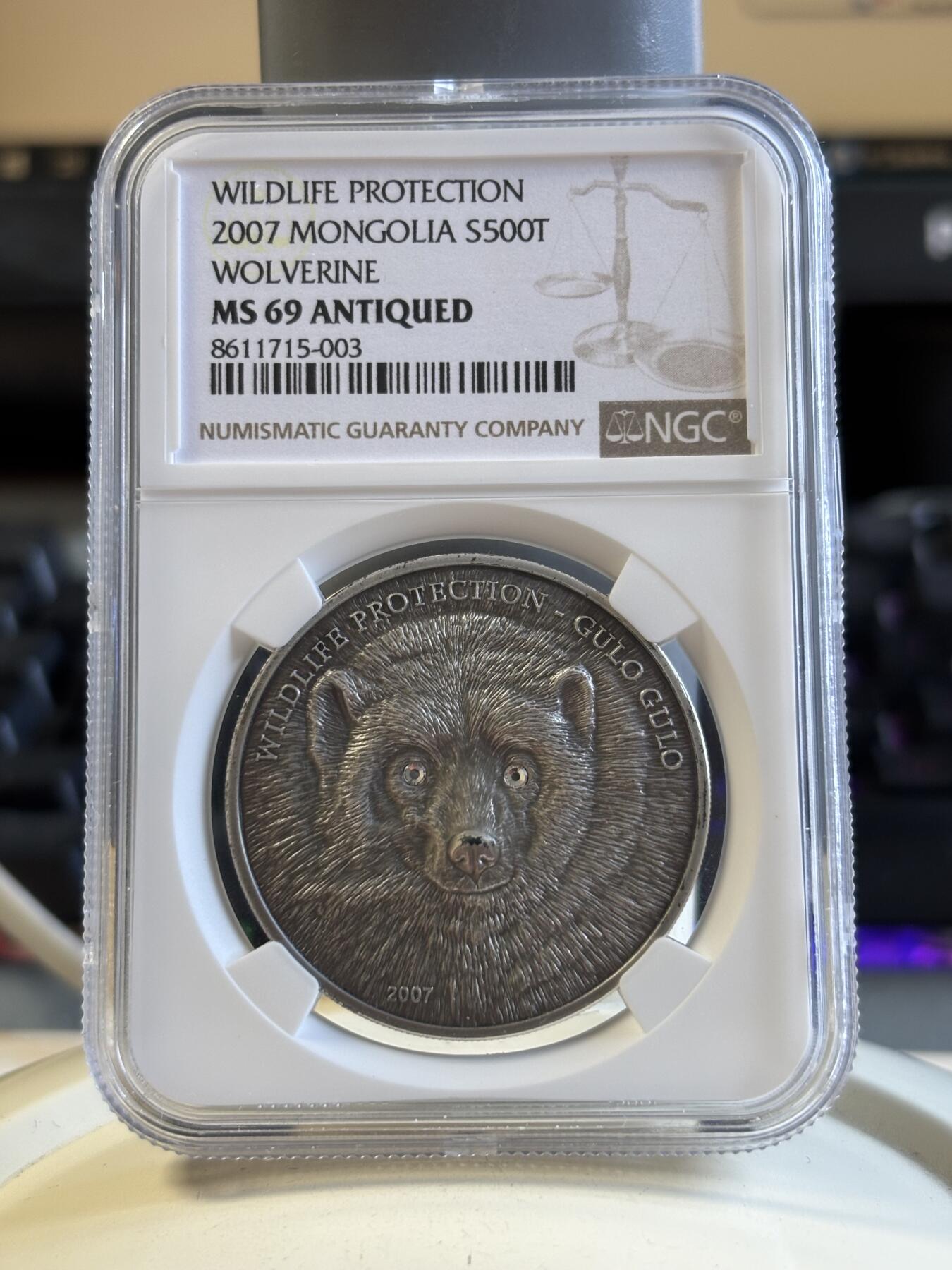第195期拍卖 获奖蒙古2007年仿古动物狼獾镶水晶银币NGC-MS69带证书，999银，发行2500枚