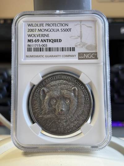 第195期拍卖 - 获奖蒙古2007年仿古动物狼獾镶水晶银币NGC-MS69带证书，999银，发行2500枚