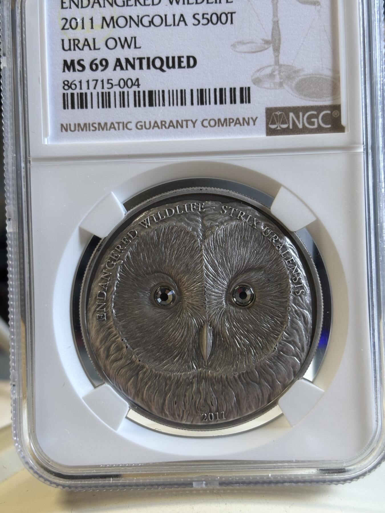 第195期拍卖 获奖蒙古2011猫头鹰仿古镶水晶纪念银币NGC-MS69，999银，发行2500枚，
