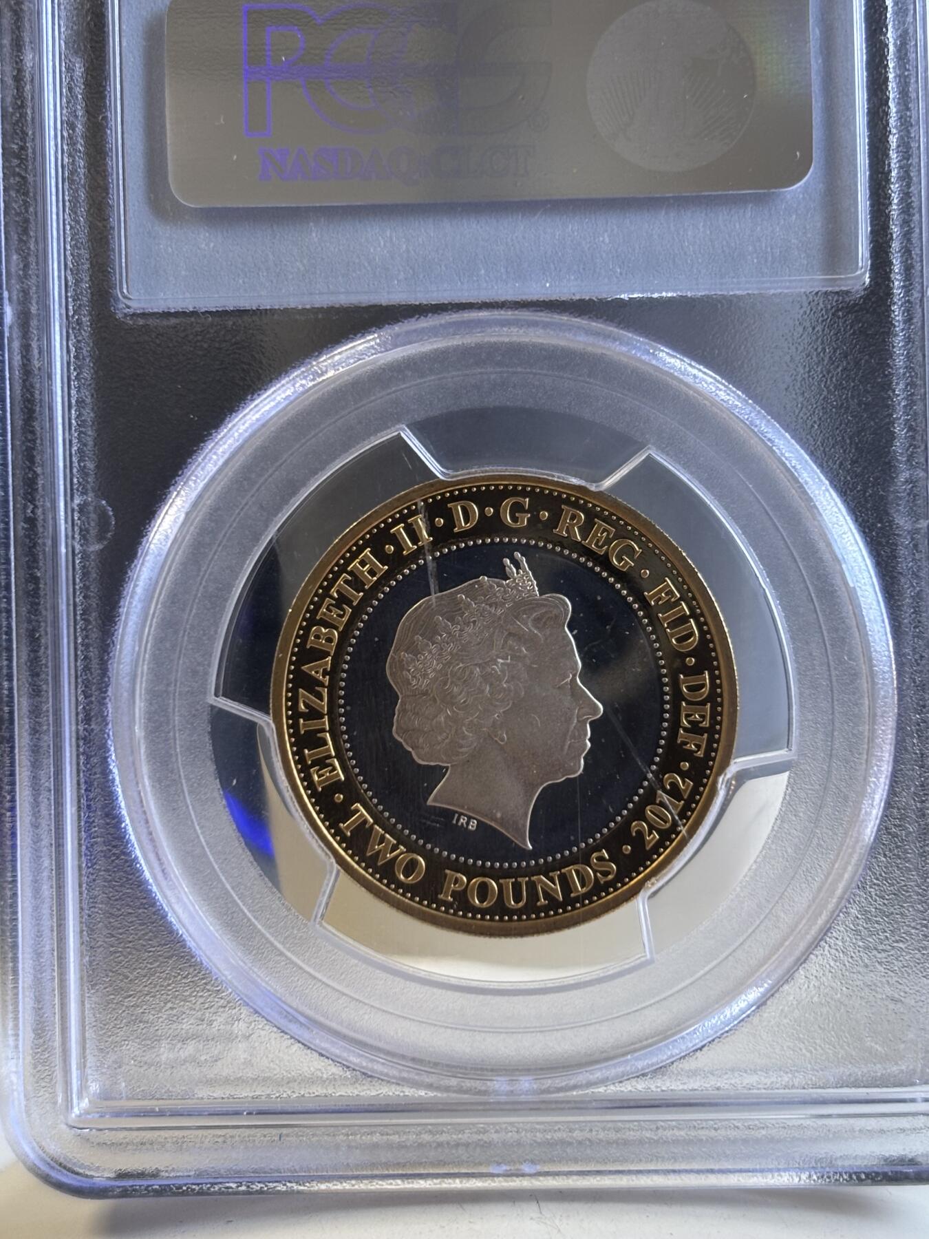 第196期拍卖 获奖英国2012年狄更斯诞辰2英镑加厚银币PCGS-PR69，925银镀金，24克，发行2000枚