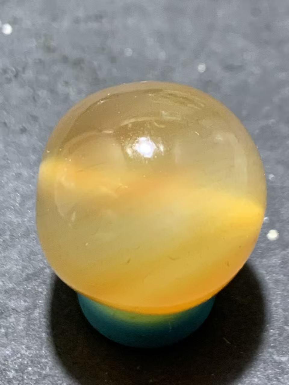 高玉化缠丝玛瑙随形圆珠一颗，