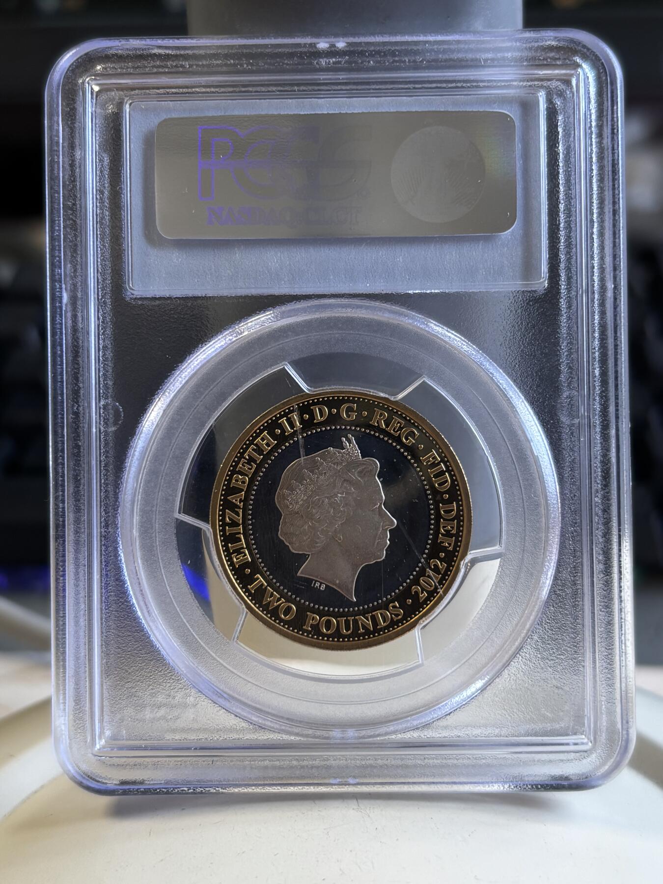 第196期拍卖 获奖英国2012年狄更斯诞辰2英镑加厚银币PCGS-PR69，925银镀金，24克，发行2000枚
