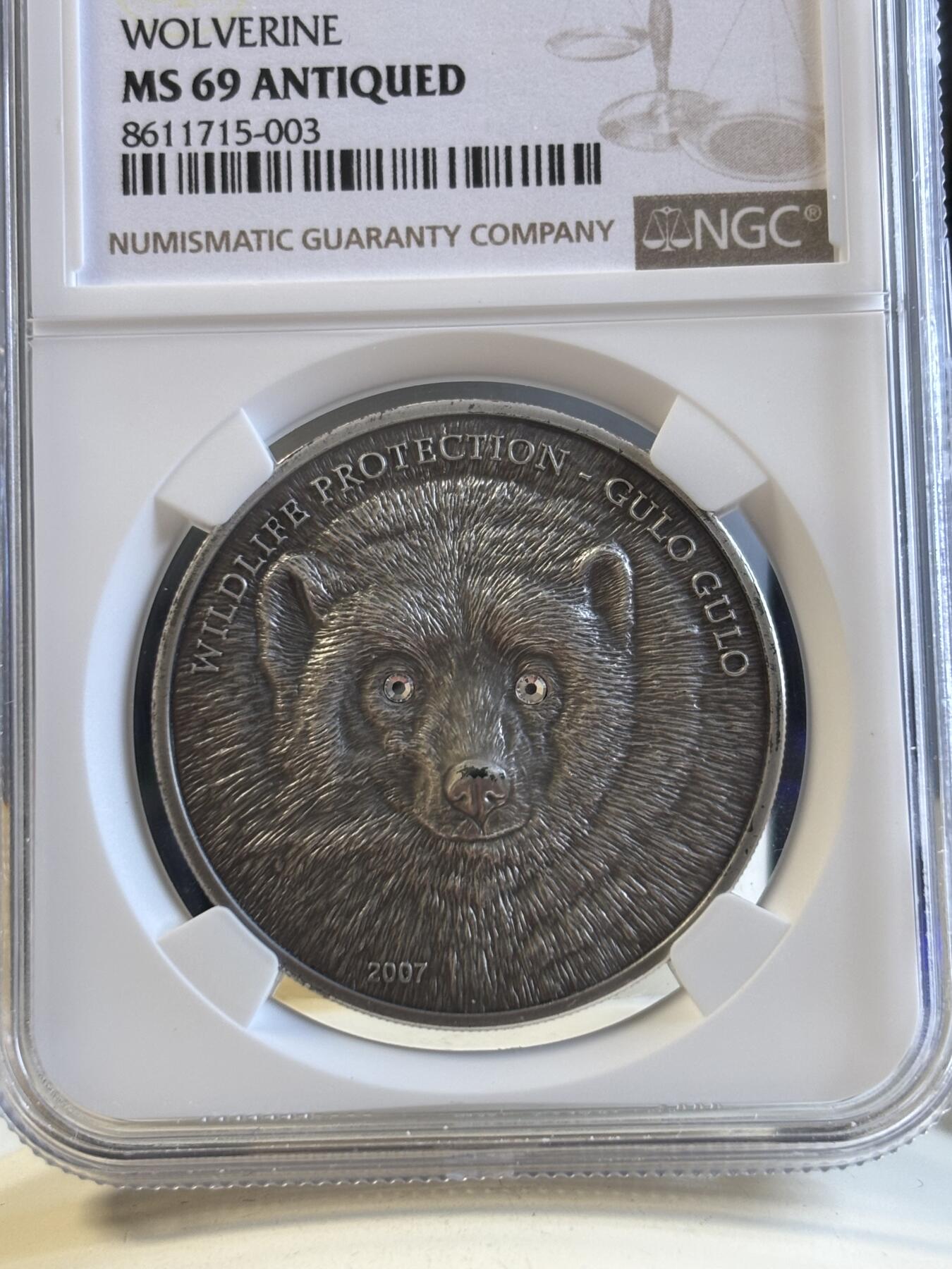 第195期拍卖 获奖蒙古2007年仿古动物狼獾镶水晶银币NGC-MS69带证书，999银，发行2500枚