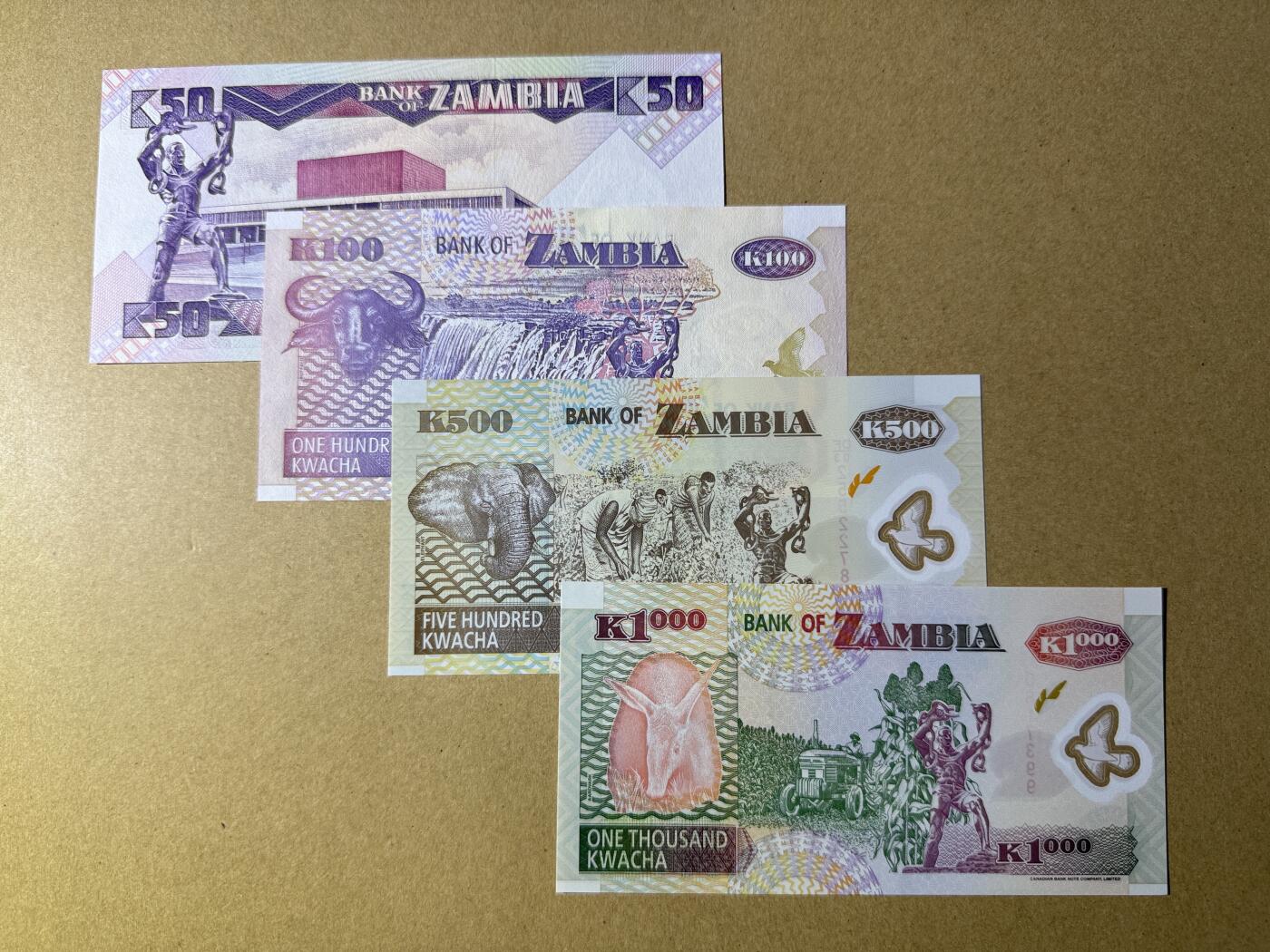 《愛美收藏》第239期-4.5周日外币黄金场  赞比亚4张 UNC 不同面值4张 100的边缘荧光