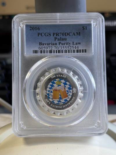 第196期拍卖 - 帕劳2016德国啤酒纯度法500周年彩银币PCGS-PR70，999银，2.5克，发行2500枚，评级盒有裂痕