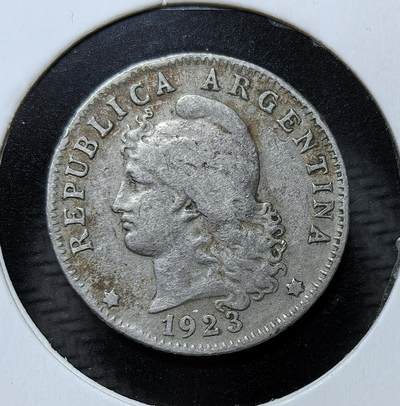 外国优质银币克朗币纪念章，每周六晚九点倒数截拍，满百包邮可寄存，持续收拍 - 阿根廷共和国1923 年20 分镍币，正面为自由女神头像，背面以月桂环环绕面值，是阿根廷近代民族国家建设时期的流通辅币，见证了其 20 世纪初的经济与货币史。