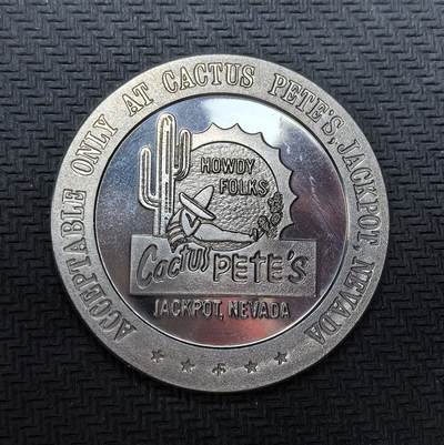 外国优质银币克朗币纪念章，每周六晚九点倒数截拍，满百包邮可寄存，持续收拍 - 精制美国1968年内华达州仙人掌皮特赌场1 美元代币。位于内华达州与爱达荷州的边境小镇 Jackpot，以独特的西部仙人掌地标为设计，是美国西部边境赌场文化的经典实物见证。