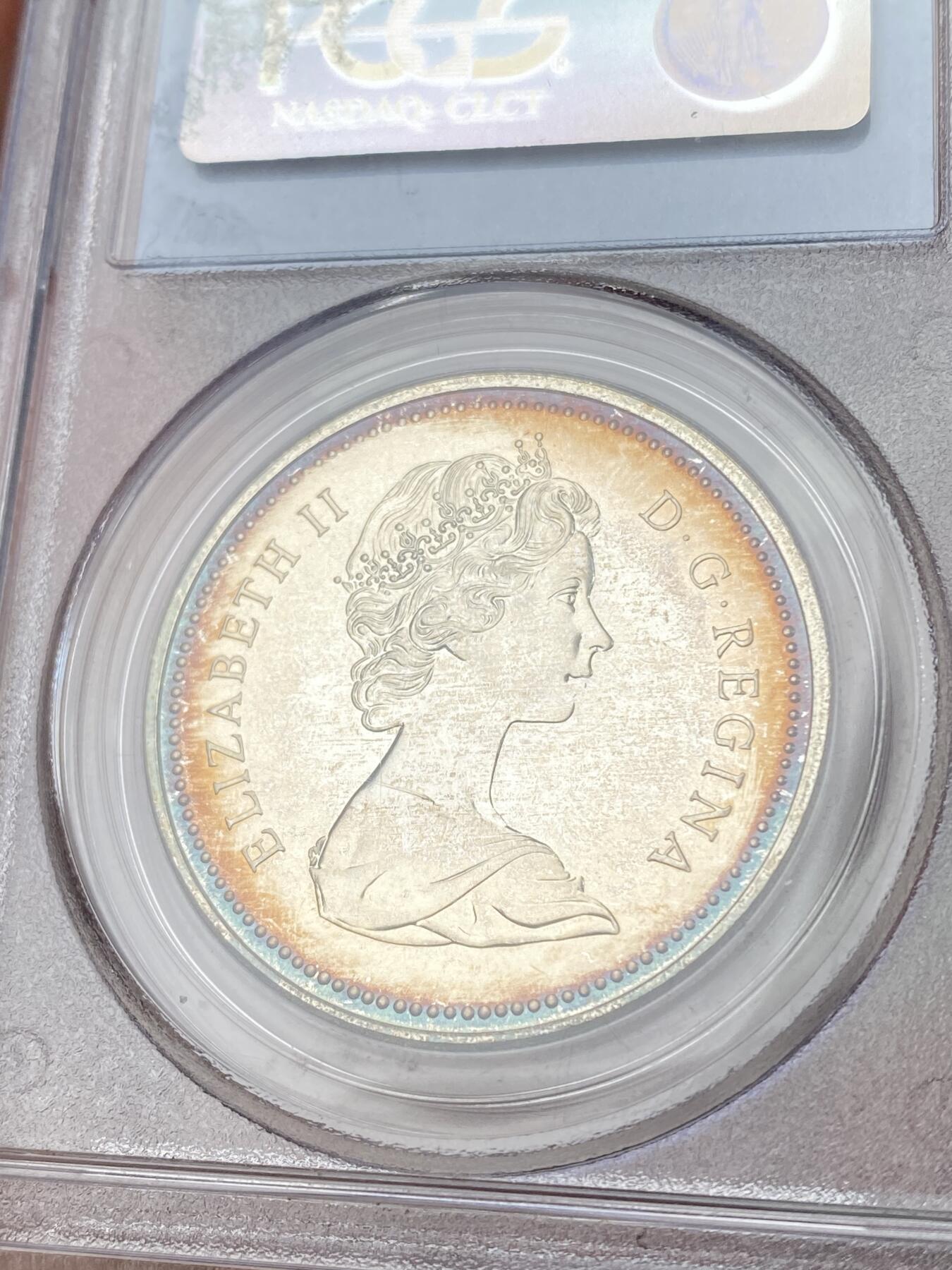 万国钱币拍卖第064期 PCGS SP68 1971加拿大伊丽莎白二世不列颠哥伦比亚省百年纪念银币 加拿大皇家造币厂铸 镜面七彩极美 （评级盒正面左上角破损）