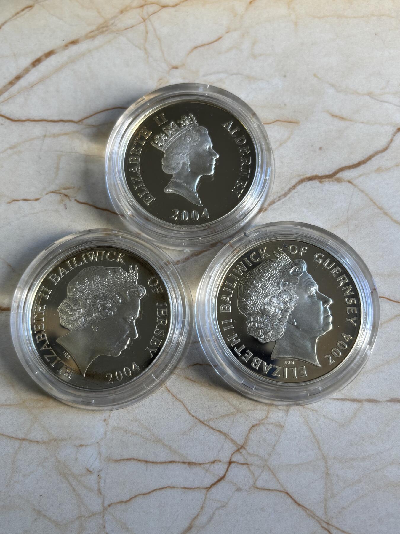 第196期拍卖 泽西根西奥尔德尼2004年诺曼底登陆纪念银币3枚套，925银，28.28克*3，发行25000套，有氧化