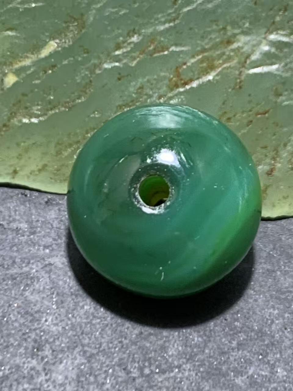 精美高玉化缠丝玛瑙随形碟珠一颗，