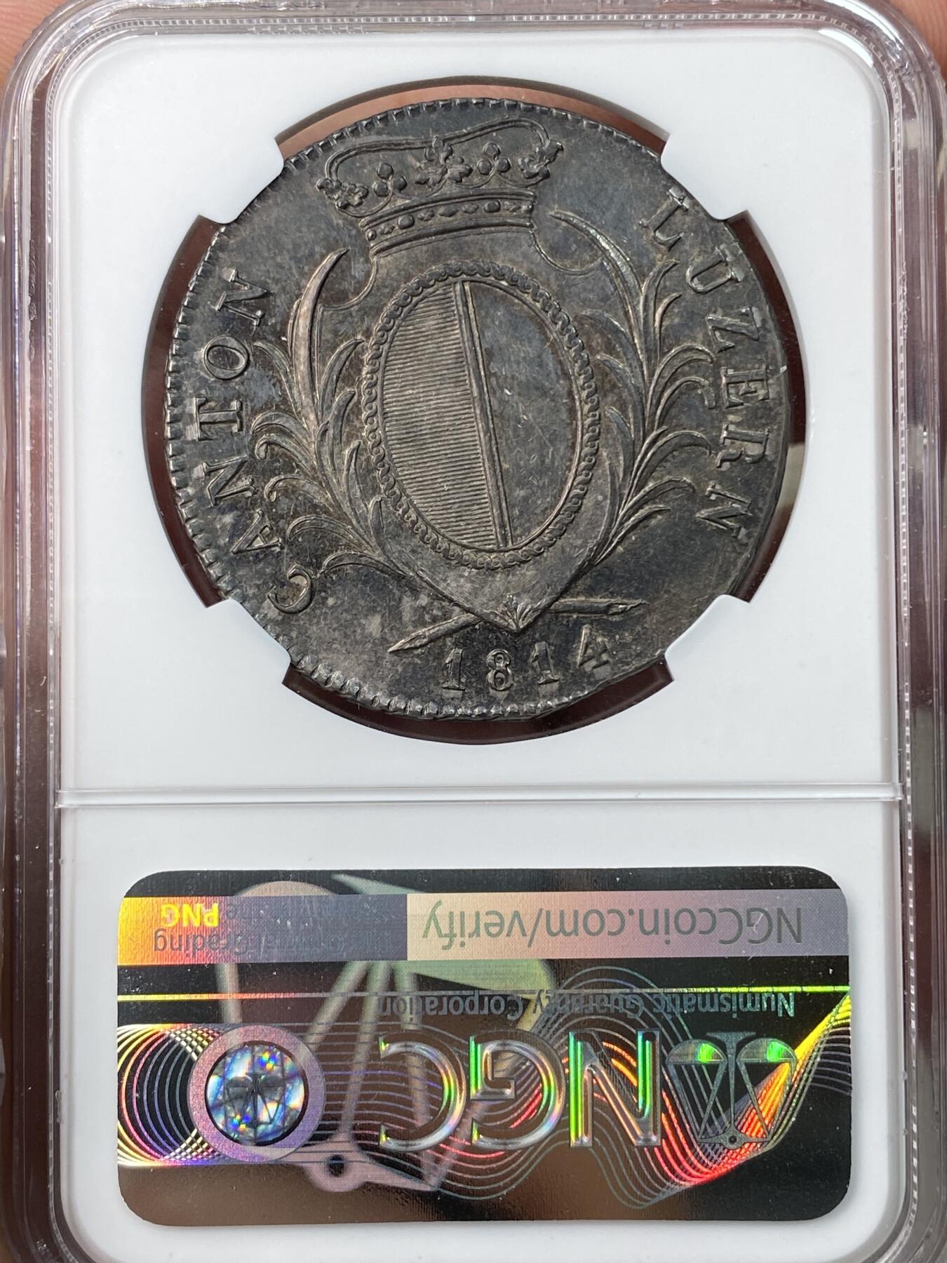 万国钱币拍卖第064期 NGC MS61 1814年瑞士联邦卢瑟恩雇佣兵4法郎大银币 经典瑞士雇佣兵系列 原味深五彩火烧云倒影包浆美轮美奂收藏级 潜力品种