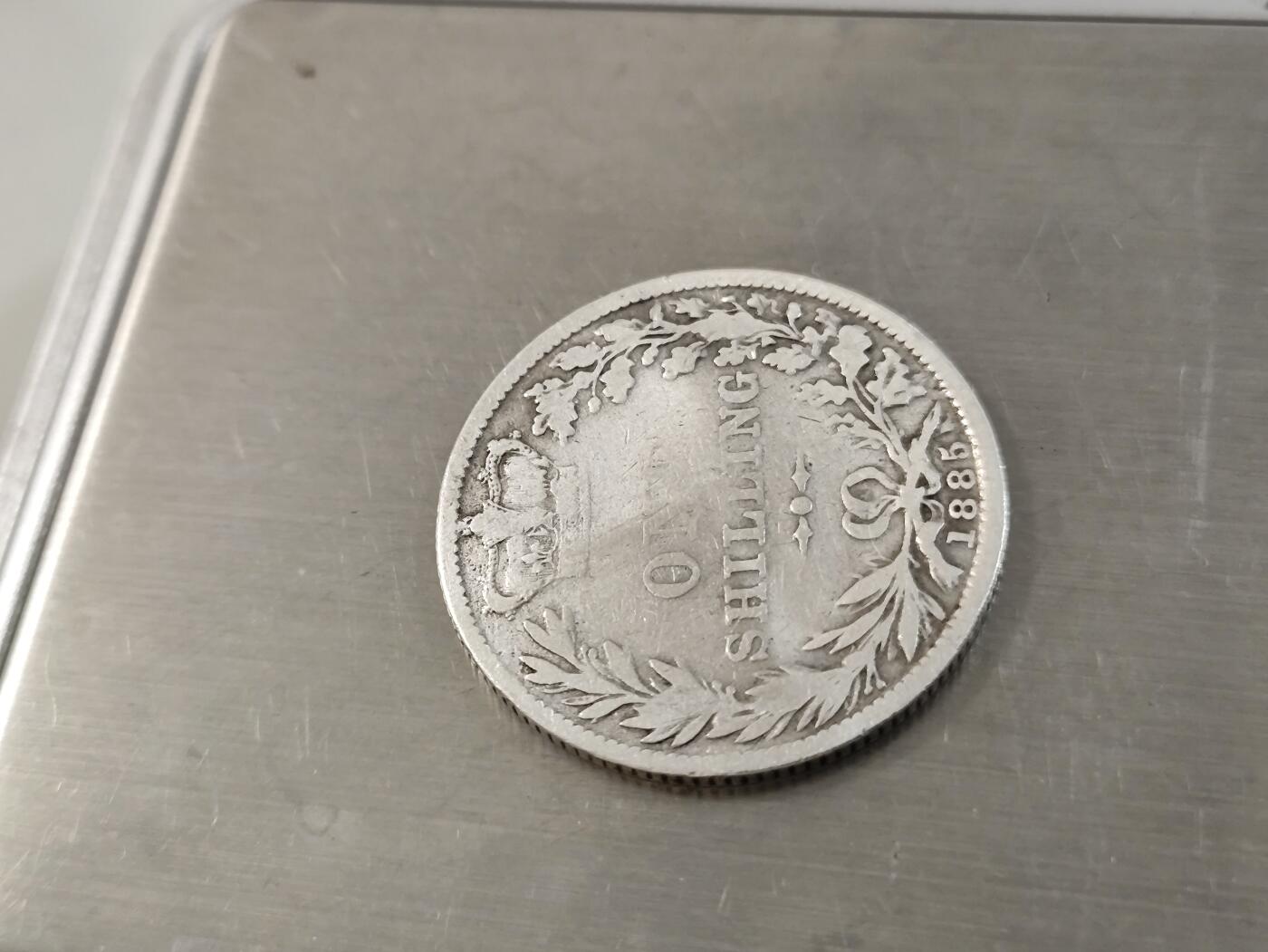 英国1先令银币，1885英国维多利亚年轻头像银币