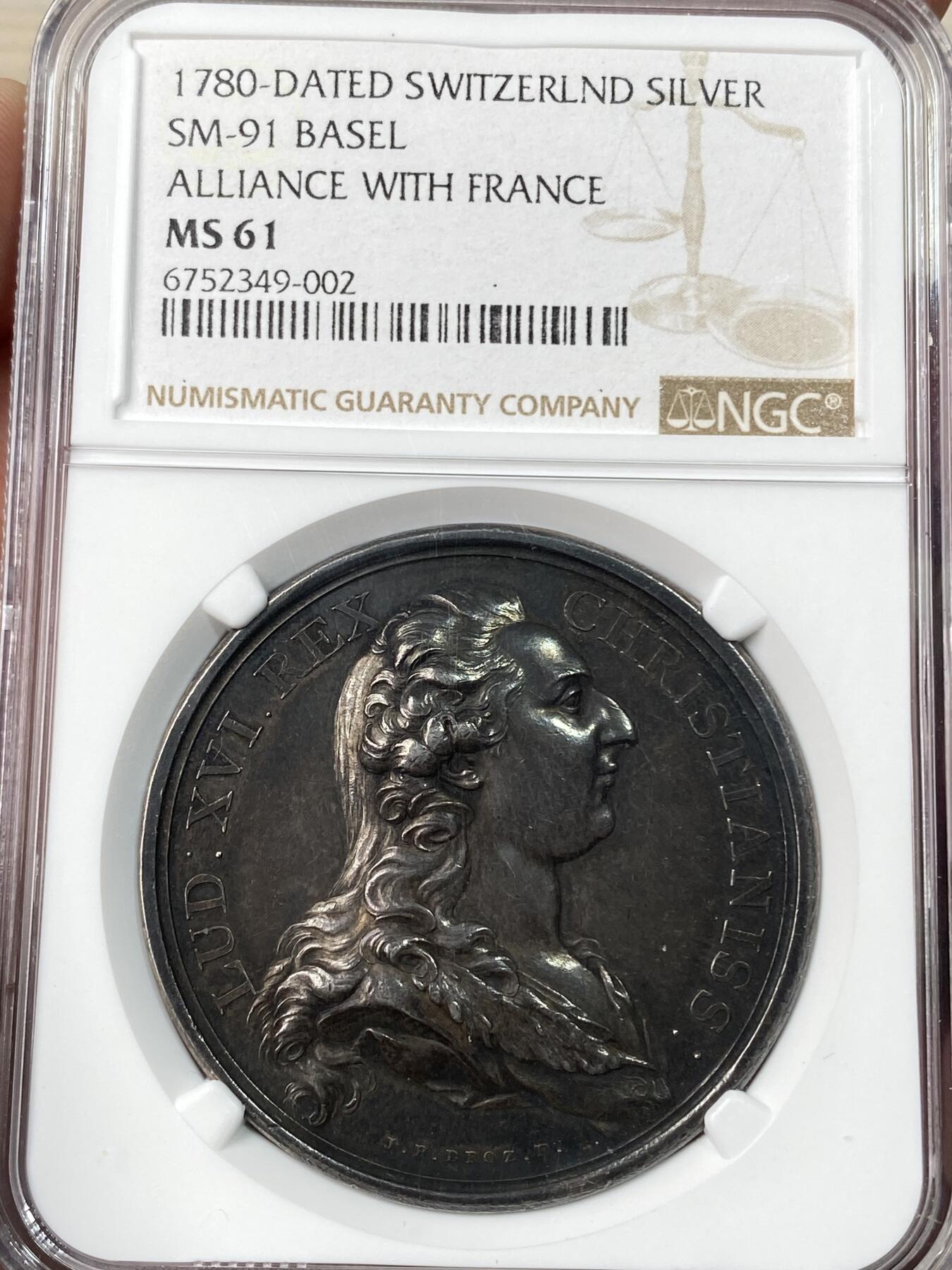 万国钱币拍卖第064期 NGC MS61 1780年法国路易十六世与巴塞尔结为全新且稳固的联盟纪念银章 高浮雕浓郁黑彩罕见品种
